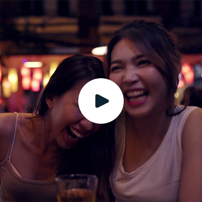 Two friends laughing